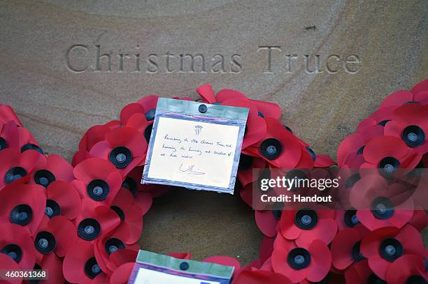 In this handout image supplied by The FA, A close-up view of the wreath left by Prince William, Duke of Cambridge is seen during the unveiling of the...