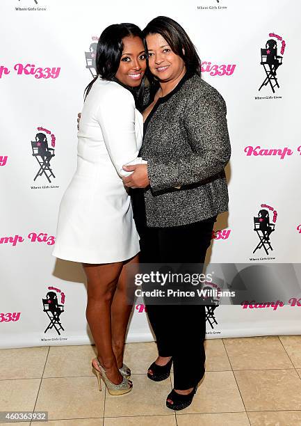 Keyshia Knight Pulliam and Denise Pulliam attend Jimmy Choo at Phipps Plaza on December 11, 2014 in Atlanta, Georgia.