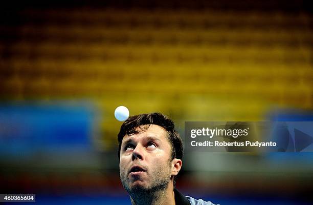 Samsonov Vladimir of Belarus in action during the Men's singles round of 16 of the 2014 ITTF World Tour Grand Finals at Huamark Indoor Stadium on...