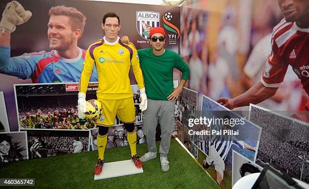Ranbir Kapoor, Bollywood Actor poses with the Ben Foster mannequin at one of the promotional tents during the Barclays Premier League 'Live' event on...