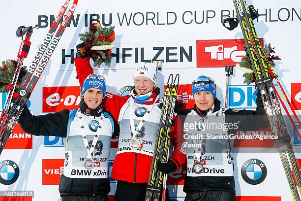 Simon Schempp of Germany takes 2nd place Johannes Thingnes Boe of Norway takes1st place,Andreas Birnbacher of Germany takes 3rd place during the IBU...