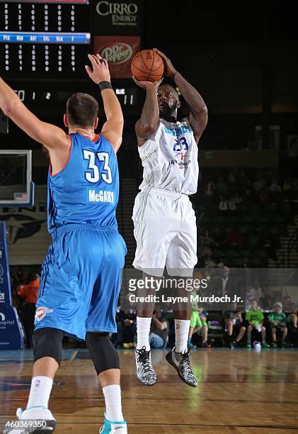 Ivan Johnson of the Texas Legends shoots the ball against the Oklahoma City Blue during an NBDL game on December 5, 2014 at the Dr. Pepper Arena in...