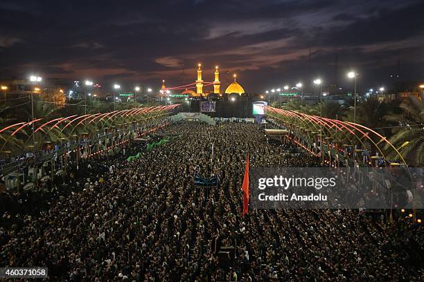 Shi'ite people gather during the Arba'een ceremony in the holy city of Karbala, southern Iraq on December 12, 2014. Hundreds of Shiite worshippers...