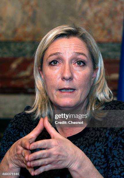 France's far-right leader Marine Le Pen arrives to deliver a speech on December 12 in Paris, France. Marine Le Pen considers "intolerable" the...