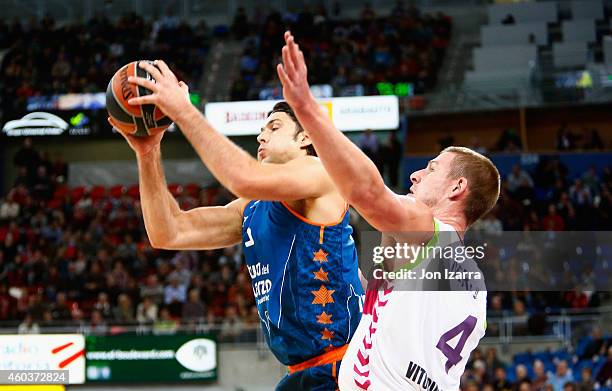 Kresimir Loncar, #25 of Valencia Basket competes with Colton Iverson, #4 of Laboral Kutxa Vitoria during the 2014-2015 Turkish Airlines Euroleague...