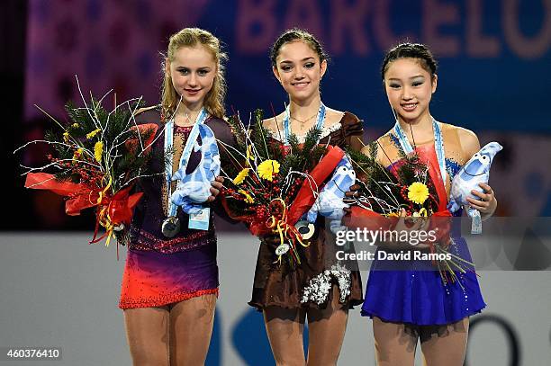 Serafima Sakhanovich of Russia, Evgenia Medvedeva of Russia and Wakaba Higuchi of Japan pose during the medals ceremony during day two of the ISU...