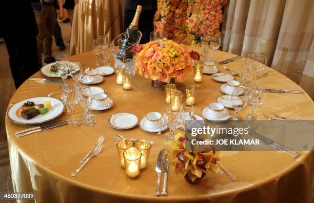 Table is set up during the menu preview for the 71th annual Golden Globe awards at the Beverly Hilton Hotel on January 3, 2014 in Beverly Hills,...