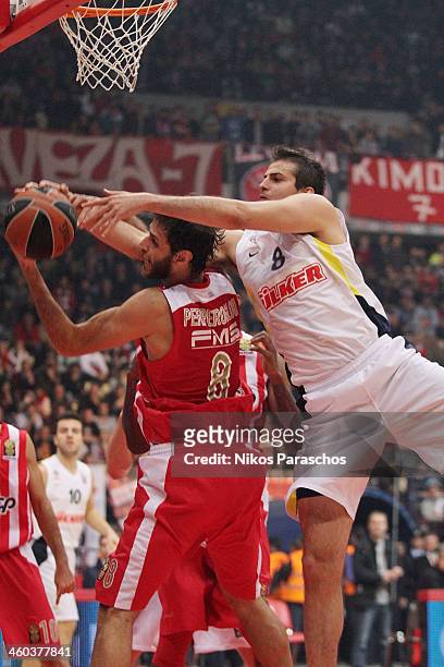 Stratos Perperoglou, #8 of Olympiacos Piraeus competes with Nemanja Bjelica, #8 of Fenerbahce Ulker Istanbu during the 2013-2014 Turkish Airlines...