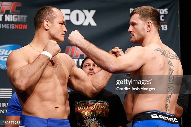 Opponents Junior Dos Santos of Brazil and Stipe Miocic face off during the UFC Fight Night weigh-in event at the Phoenix Convention Center on...