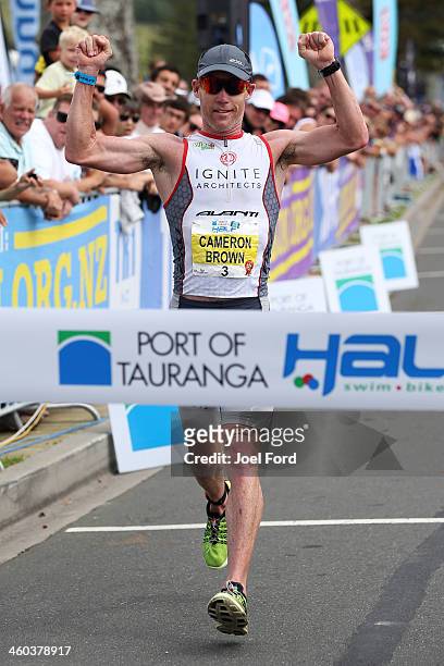 Cameron Brown reacts to winning the Port of Tauranga 1/2 Ironman on January 4, 2014 in Tauranga, New Zealand.