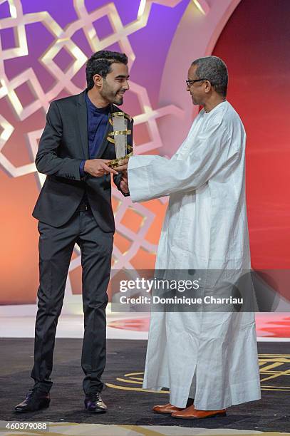 Essam Doukhou awarded Cinecoles Award by Abderrahmane Sissako during the 14th Marrakech International Film Festival on December 12, 2014 in...