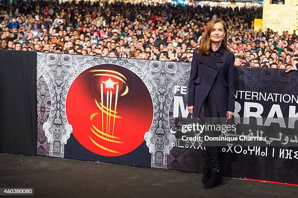 Jury Member Isabelle Huppert presents 'La Ritournelle' during 14th Marrakech International Film Festival at Jemaa el-Fnaa Square on December 12, 2014...