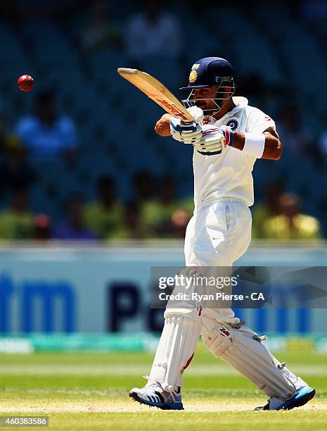 Virat Kohli of India bats during day five of the First Test match between Australia and India at Adelaide Oval on December 13, 2014 in Adelaide,...