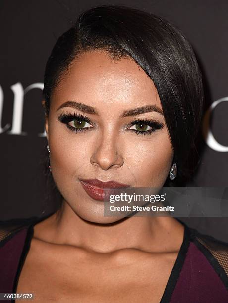 Kat Graham arrives at the Rihanna's First Annual Diamond Ball at The Vineyard on December 11, 2014 in Beverly Hills, California.