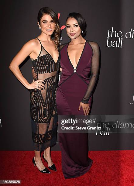 Nikki Reed and Kat Graham arrives at the Rihanna's First Annual Diamond Ball at The Vineyard on December 11, 2014 in Beverly Hills, California.