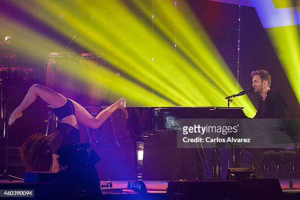 Spanish singer Pablo Alboran performs on stage during the "40 Principales" awards 2013 ceremony at the Barclaycard Center on December 12, 2014 in...