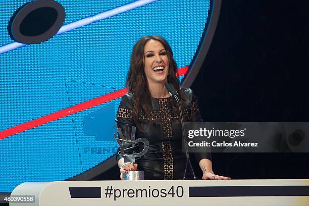 Spanish singer Malu receives an 40 Principales award during the "40 Principales" awards 2013 ceremony at the Barclaycard Center on December 12, 2014...