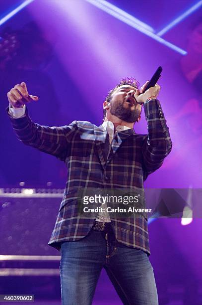 Spanish singer David Bisbal performs on stage during the "40 Principales" awards 2013 ceremony at the Barclaycard Center on December 12, 2014 in...