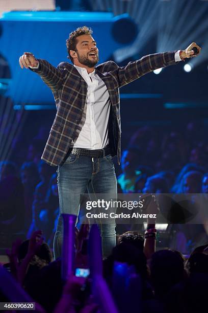 Spanish singer David Bisbal performs on stage during the "40 Principales" awards 2013 ceremony at the Barclaycard Center on December 12, 2014 in...