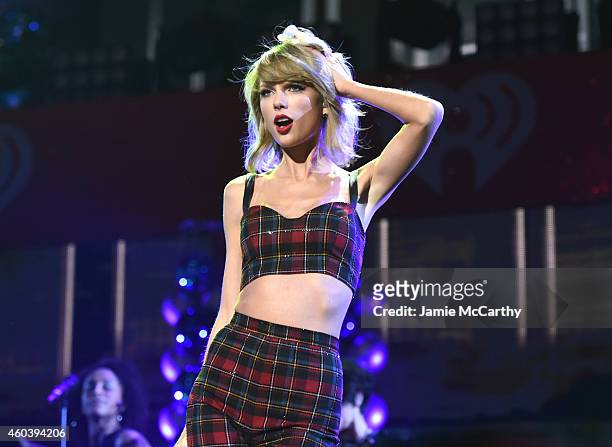 Taylor Swift performs onstage during iHeartRadio Jingle Ball 2014, hosted by Z100 New York and presented by Goldfish Puffs at Madison Square Garden...