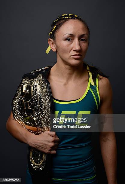 Women's strawweight champion Carla Esparza poses for a post-fight portrait backstage during The Ultimate Fighter Finale event inside the Pearl...