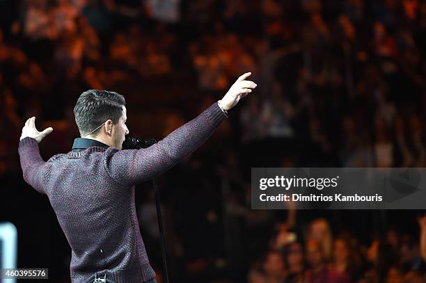 Nick Jonas performs onstage during iHeartRadio Jingle Ball 2014, hosted by Z100 New York and presented by Goldfish Puffs at Madison Square Garden on...