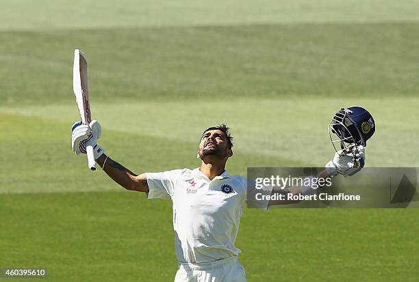 Virat Kohli of India celebrates after reaching his century during day five of the First Test match between Australia and India at Adelaide Oval on...