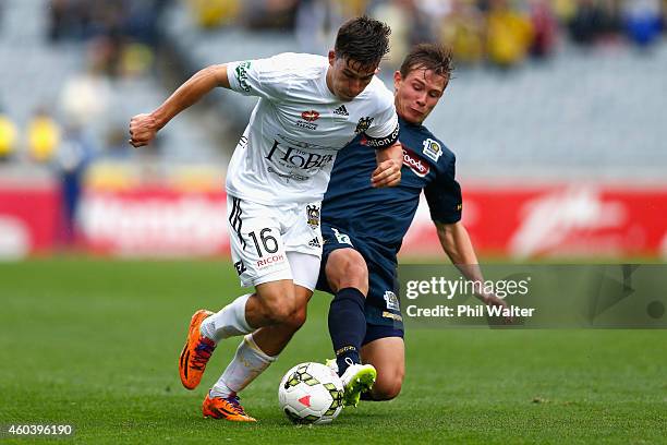 Louis Fenton of the Phoenix is tackled by Nick Fitzgerald of the Mariners during the round 11 A-League match between the Wellington Phoenix and the...