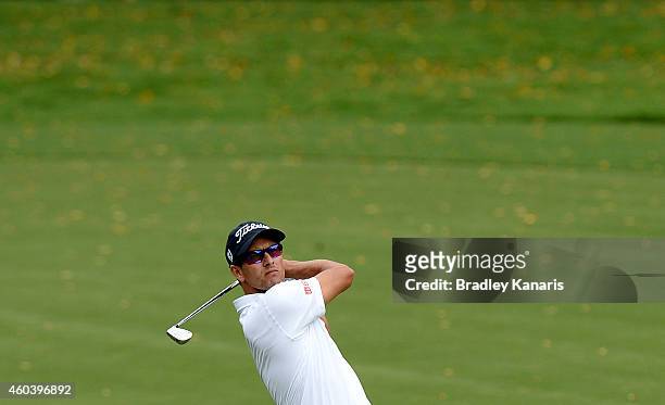 Adam Scott of Australia plays a shot on the 17th hole during day three of the 2014 Australian PGA Championship at Royal Pines Resort on December 13,...