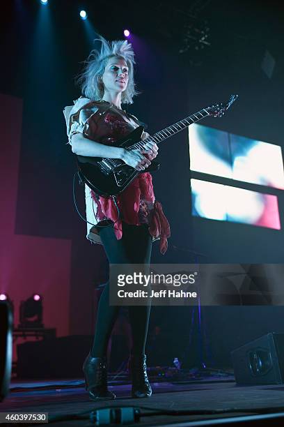 Singer/guitarist Annie Clark aka St. Vincent performs at Time Warner Cable Arena on December 12, 2014 in Charlotte, North Carolina.