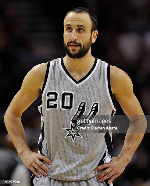 Guard Manu Ginobili of the San Antonio Spurs walks up court in the second half of an NBA basketball game against the Los Angeles Lakers at the AT&T...