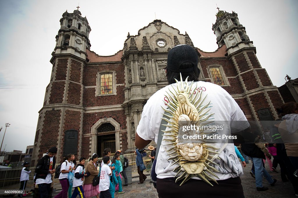 A man arrives at the old Basilica of Our Lady of Guadalupe...