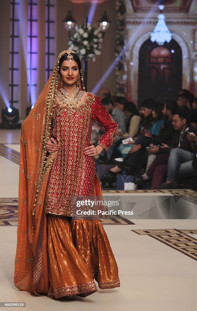 Pakistani model presents creations by Pakistani designers...