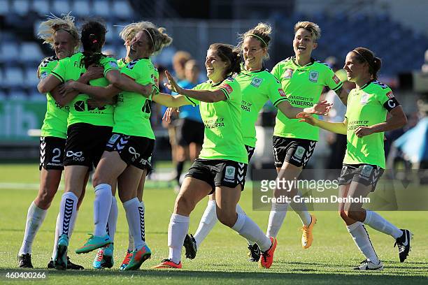 Canberra United celebrate victory in the W-League Semi Final match between Melbourne Victory and Canberra United at Simonds Stadium on December 13,...