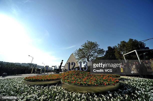 The national memorial themed plates and sculptures are for China's first National Memorial Day on December 13, 2014 in Nanjing, Jiangsu province of...