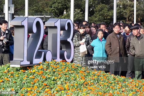 Citizens attend the China's first National Memorial Day held at the Memorial Hall of the Victims in Nanjing Massacre by Japanese Invaders on December...
