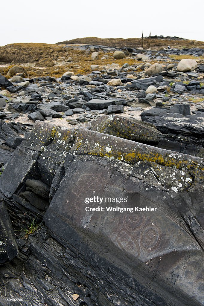 Petroglyphs on rocks at Petroglyph Beach State Historic Park...