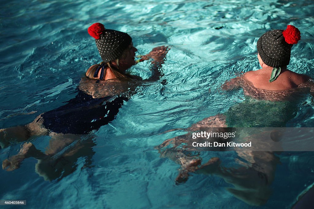 Swimmers Dress Up For The Annual 'December Dip'