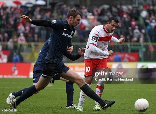 Haris Bukva of Erfurt challenges Christian Stuff of Rostock during the 3.Liga match between FC Rot Weiss Erfurt and FC Hansa Rostock at...