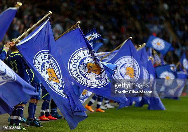 Young Leicester flag bearers take to the field prior to kickoff during the Barclays Premier League match between Leicester City and Manchester City...