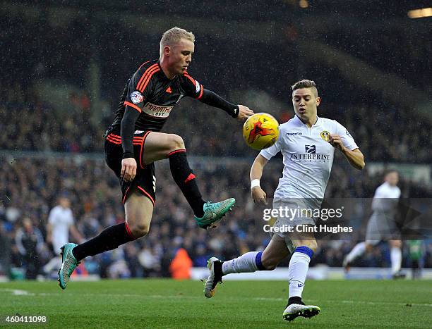 Adryan of Leeds United looks on as Jack Grimmer of Fulham clears the ball up field during the Sky Bet Championship match between Leeds United and...