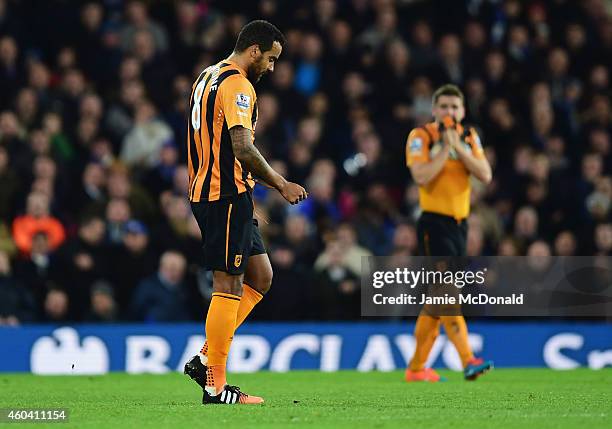 Tom Huddlestone of Hull City looks dejected as he is sent off during the Barclays Premier League match between Chelsea and Hull City at Stamford...