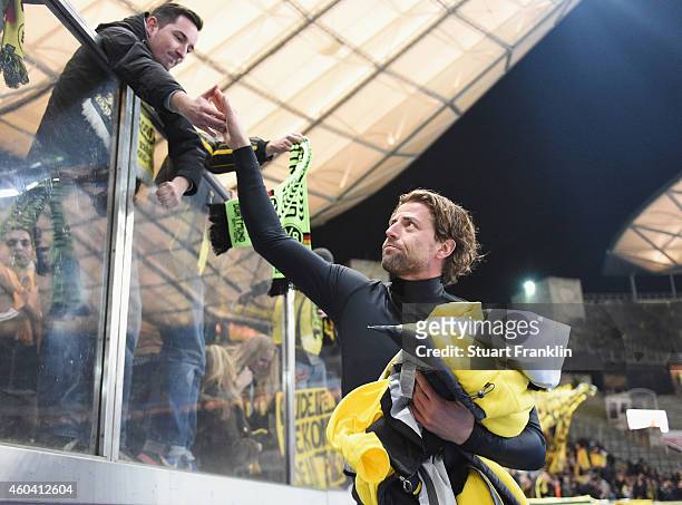 Roman Weidenfeller of Dortmund greets fans after the Bundesliga match between Hertha BSC and Borussia Dortmund at Olympiastadion on December 13, 2014...