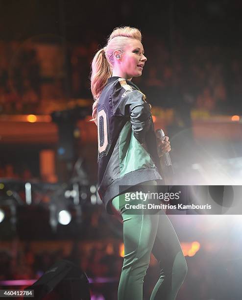 Iggy Azalea performs during the iHeartRadio Jingle Ball 2014, hosted by Z100 New York and presented by Goldfish Puffs at Madison Square Garden on...