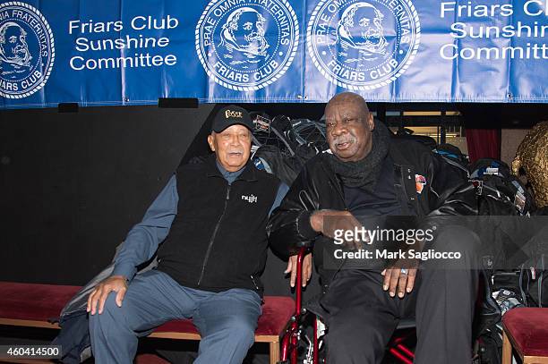 Former New York Mayor David N. Dinkins and Former New York Knicks Cal Ramsey attend the Friar Club's Sunshine Committee Holiday Party at the Ziegfeld...