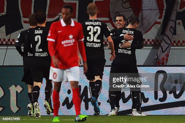 Filip Kostic of Stuttgart celebrates his team's first goal with team mates during the Bundesliga match between 1. FSV Mainz 05 and VfB Stuttgart at...