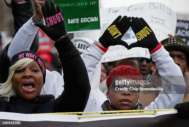 Lesley McSpadden , mother of police shooting victim Michael Brown, helps lead the "Justice For All" rally and march against police brutality and the...