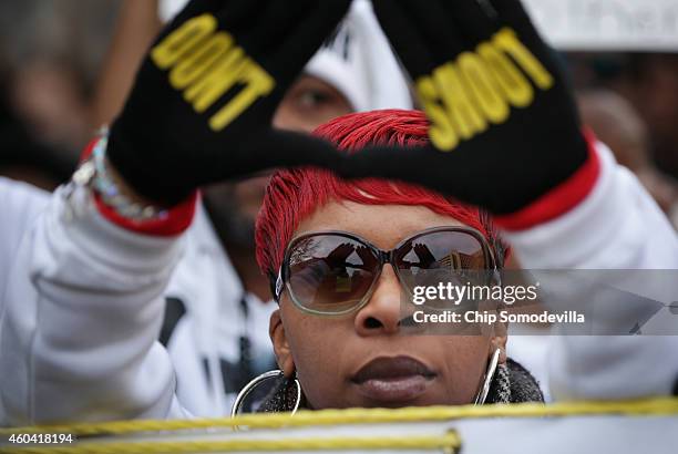 Lesley McSpadden, mother of police shooting victim Michael Brown helps lead the "Justice For All" rally and march against police brutality and the...