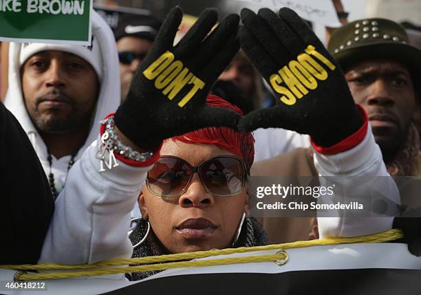 Lesley McSpadden, mother of police shooting victim Michael Brown, helps lead the "Justice For All" rally and march against police brutality and the...