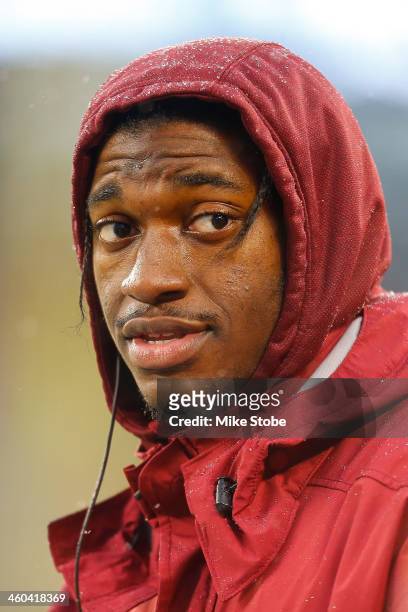 Robert Griffin III of the Washington Redskins looks on during the game against the New York Giants at MetLife Stadium on December 29, 2013 in East...
